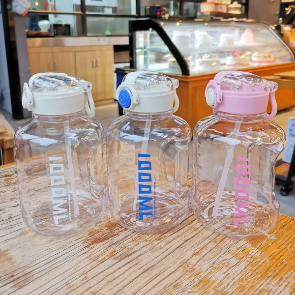 Large-capacity portable fitness transparent space sports plastic water bottle with straw