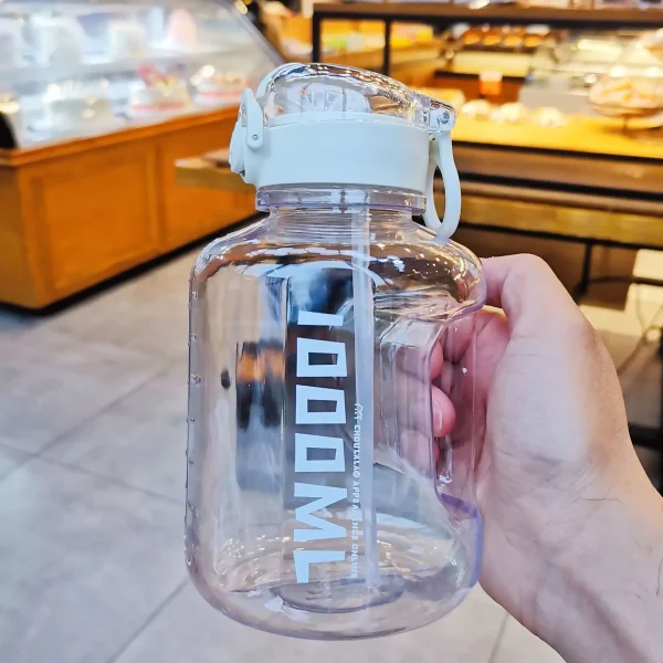 Large-capacity portable fitness transparent space sports plastic water bottle with straw